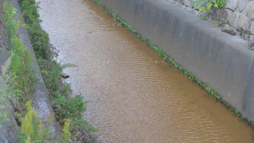 Material from the ochre-tinted river landscape.