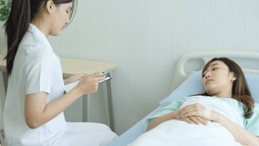 Nurse Attending to Female Patient in Hospital Bed, Compassionate Medical Care and Health Assessment in Clinical Setting, Providing Support and Comfort in Recovery Process. - Powered by Shutterstock - Get 15% off with code: PIKWIZARD15