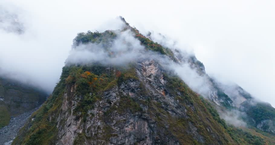 amazing view of mist floating among the cliff mountain at Sichuan China autumn day