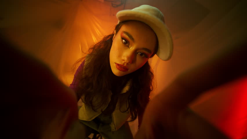 Candid Portrait of a Young Woman Captured in an Engaging and Artistic Environment