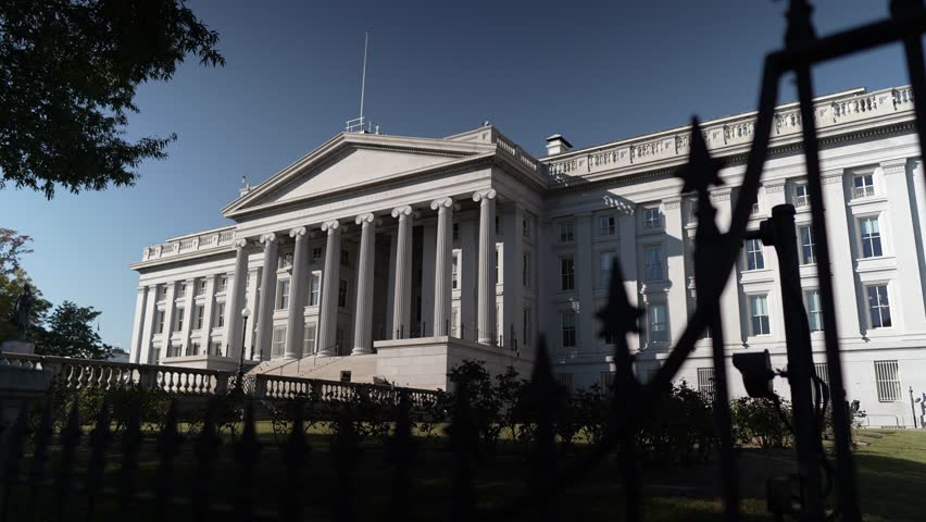 Wide angle view pushing in to the US Department of the Treasury next to the White House in Washington DC.