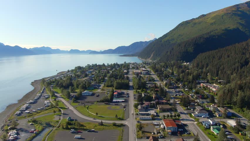 Sunny aerial view of Seward, Alaska, during the fall season, showcasing the vibrant colors of the landscape. Perfect for scenic, travel, and seasonal content