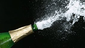 Super slow motion of Champagne explosion with flying cork closure, opening champagne bottle closeup. Filmed on high speed cinematic camera at 1000 frames per second. - Powered by Shutterstock - Get 15% off with code: PIKWIZARD15