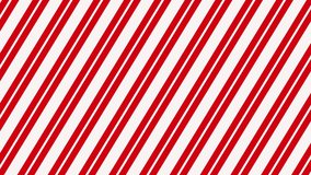 Candy cane striped Christmas wrapping paper transitions on a green screen background. - Powered by Shutterstock - Get 15% off with code: PIKWIZARD15
