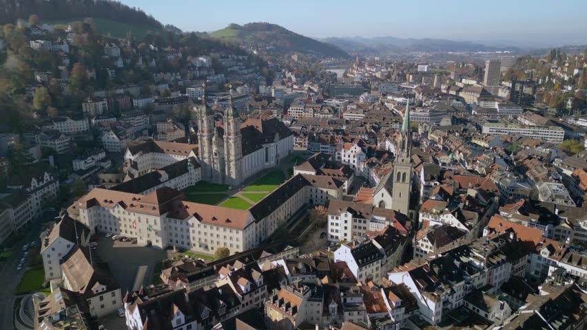 Drone aerial footage of Abbey of St Gall and old town of St Gallen. The Abbey of Saint Gall is a dissolved abbey in a Catholic religious complex in the city of St. Gallen in Switzerland.
