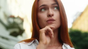Close up thinking pensive Caucasian woman girl face looking up urban street city female lady tourist businesswoman think deep thoughts dream planning ponder consider doubt idea choose outdoors town - Powered by Shutterstock - Get 15% off with code: PIKWIZARD15
