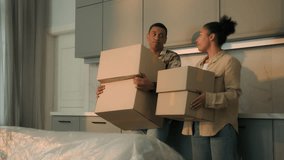 Frustrated home owners renters African American family sad couple woman man pack cardboard boxes moving day relocation leave house move out apartment credit debt mortgage bankruptcy eviction divorce - Powered by Shutterstock - Get 15% off with code: PIKWIZARD15