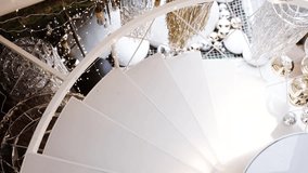 wooden staircase in the apartment is decorated with Christmas tree branches. The staircase is decorated with Christmas crafts and garlands. - Powered by Shutterstock - Get 15% off with code: PIKWIZARD15