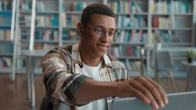 African American confident man student come sitting open laptop desktop computer start work exam preparation e-learning online books library diploma session university high school academy technology - Powered by Shutterstock - Get 15% off with code: PIKWIZARD15