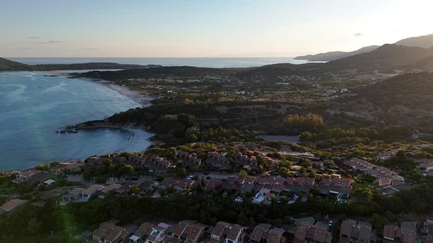 Breathtaking sunset over the coastline of Sardinia showcasing vibrant colors and serene landscapes