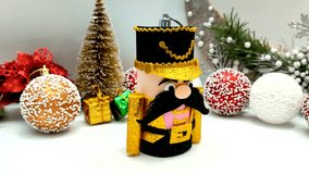 Decorated Nutcracker with Pink and Gold Outfit in a Festive Christmas Display - Powered by Shutterstock - Get 15% off with code: PIKWIZARD15