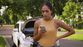Unhappy African American woman upset female businesswoman worried car driver breakdown auto texting chatting online mobile phone smartphone broke problem city transport stressed girl parking outdoors - Powered by Shutterstock - Get 15% off with code: PIKWIZARD15