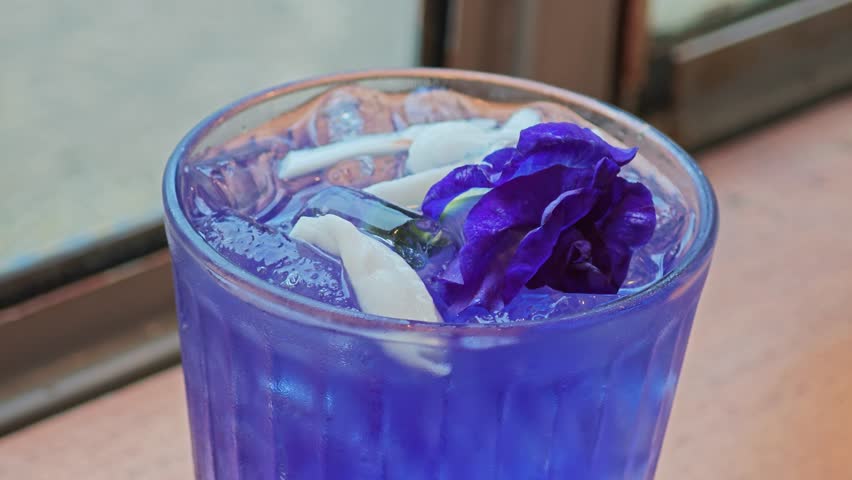 Fresh coconut butterfly pea juice