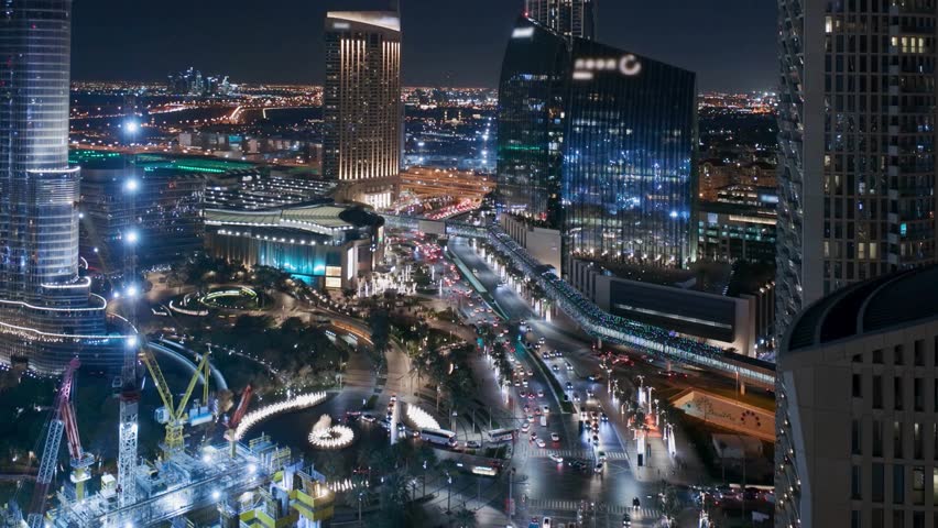 Dubai, United Arab Emirates, Night View of Corporate and World business Markets in Dubai  during night time with busy street and road, Corporate business center and Business Expocenter and Bloackchain
