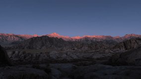 Timelapse transition from moonset to sunrise over Sierra Nevada Mountains in California, USA - Powered by Shutterstock - Get 15% off with code: PIKWIZARD15