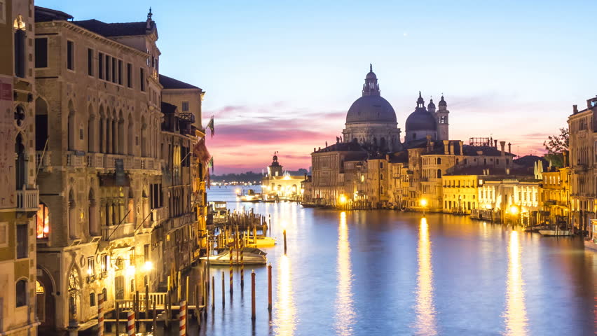 Venice Grand Canal skyline in Italy Timelapse . As UNESCO world heritage, Venice is an important tourist destination in Italy with its beautiful cityscape, also busy port of Italy .