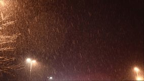 snowfall, snow against the background of lanterns, first snow, winter evening, snow is falling, winter, new year, christmas, christmas snow, merry christmas greetings - Powered by Shutterstock - Get 15% off with code: PIKWIZARD15