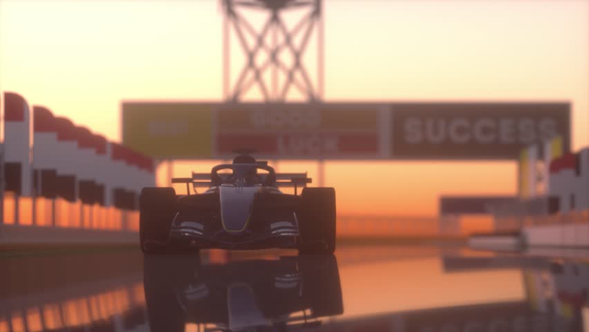 A racing car is shown in a race track with a sunset in the background