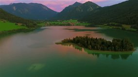 Aerial view of Lake Schliersee in the Bavarian alps in Germany. Luftaufnahme Schliersee ist ein See in den bayerischen Alpen im Landkreis Miesbach, Deutschland. Drone view Lake Schliersee at summer.  - Powered by Shutterstock - Get 15% off with code: PIKWIZARD15