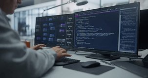Software Engineer Working on Desktop Computer in a Technological Corporate Laboratory. Anonymous Male Specialist Writing Programming Code for an Innovative Online Software Project - Powered by Shutterstock - Get 15% off with code: PIKWIZARD15