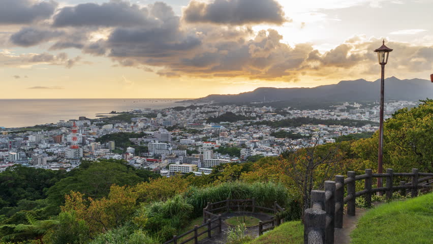 Nago, Okinawa, Japan downtown cityscape at twilight from the park.