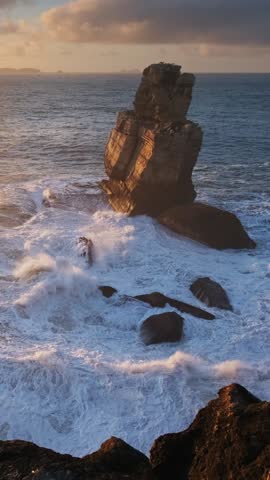 Ocean cliff rock by the sea at sunset in Cabo Carvoeiro, Peniche, Portugal