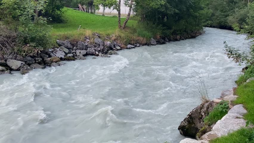 Lively raging water of mountain glacial stream, unspoiled freshwater reservoir close-up