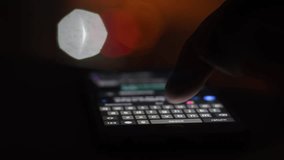 Close-up of a smartphone keyboard with a man's typing finger in the evening against a backdrop of city lights. - Powered by Shutterstock - Get 15% off with code: PIKWIZARD15