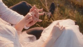 Intimate Moment A Lovely Couple Holding Hands in Nature Surrounded by Beautiful Scenery - Powered by Shutterstock - Get 15% off with code: PIKWIZARD15