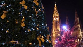 Discover the magical and enchanting atmosphere of Vienna during the Christmas season, featuring stunning decorations and a delightfully illuminated tree that spreads joy and happiness to all visitors - Powered by Shutterstock - Get 15% off with code: PIKWIZARD15
