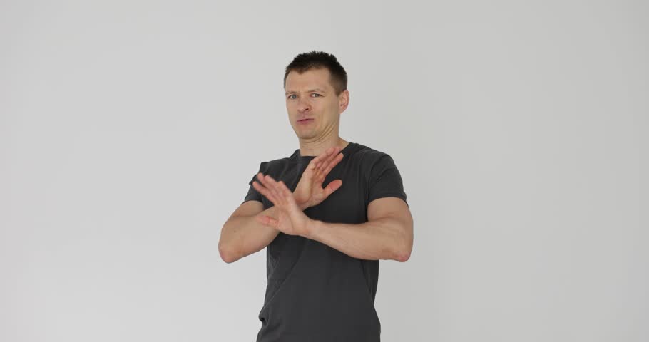 Man makes a disappointment and a gesture of denial. Gesture of denial and disagreement