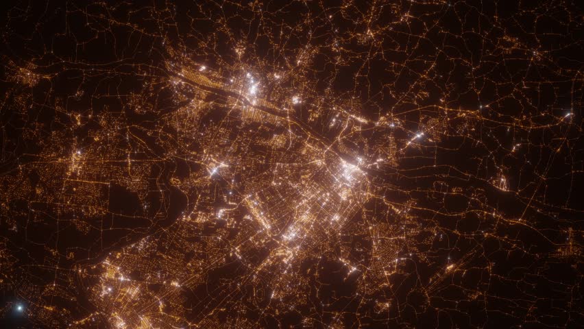 Albany (New York, USA) aerial view at night. Top view on modern city with street lights. Camera is zooming out, rotating clockwise. Vertical video. The north is on the left side