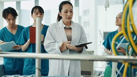 Hospital, students or doctor with simulation for education, practical or mentor for medical advice. People, physician or interns with training for learning, technique or icu for life support in Japan - Powered by Shutterstock - Get 15% off with code: PIKWIZARD15
