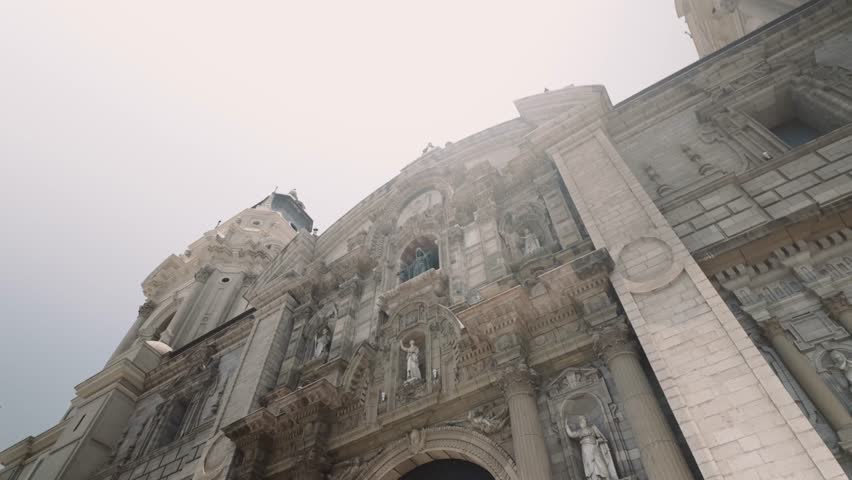 Exterior Facade Of Main Entrance Of Lima Cathedral In Peru. - low angle shot