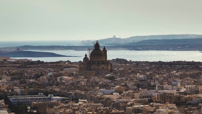 Aerial view of Victoria on the island of Gozo, Malta. Urban landscape, beautiful cathedral architecture in the Mediterranean. High quality 4k footage
