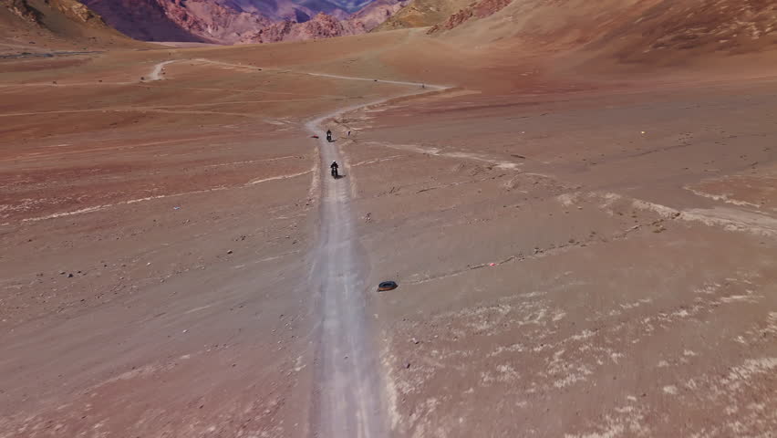 Motorcyclists Ride Through the Desert