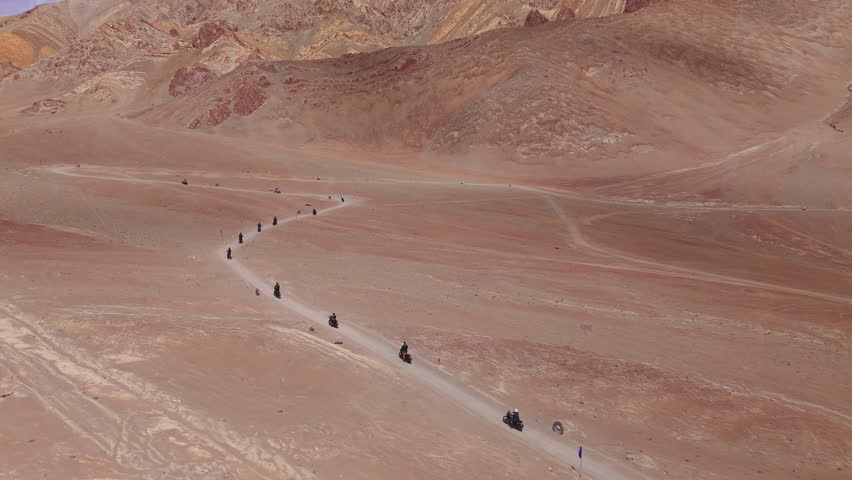Motorcyclists Ride Through the Desert