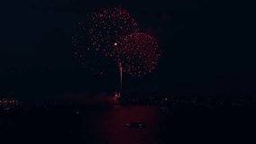 Shot of firework show on the coast of Chicago, evening time. Aerial shot view - Powered by Shutterstock - Get 15% off with code: PIKWIZARD15