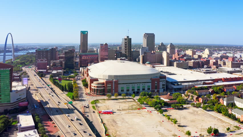 Aerial establishing shot of St. Louis, Missouri skyline with slow forward motion. St. Louis is an independent city in the U.S. state of Missouri.