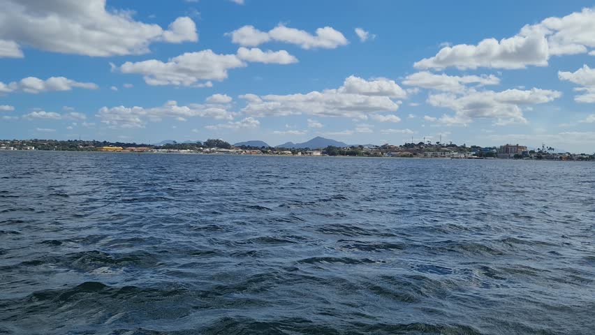 Ferry Boat Araruama Praia Seca (Dry Beach) - Crossing Araruama Lagoon, Brazil, natural beauty over calm waters.  Peaceful ride through serene landscapes, relaxing vacation in Região dos Lagos.
