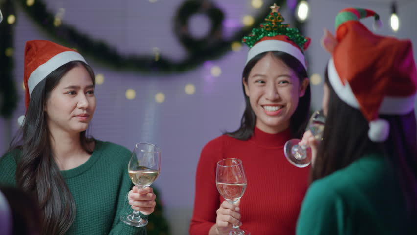 Friends join and celebrate the party with get cheers give a toast by clink glasses eating foods and drinks champagne. Happy and joyful in holiday weekend and festival.