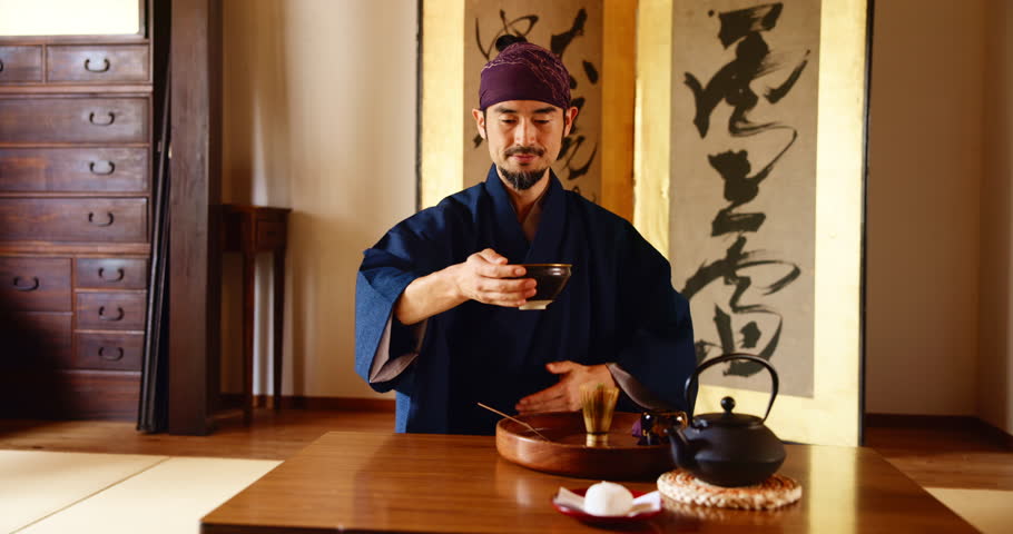 Japanese, man and bow for tea tradition with ceremony, culture respect and ancient hospitality. Male person, sacred ritual and spiritual connection, heritage customs and indigenous practice in Japan