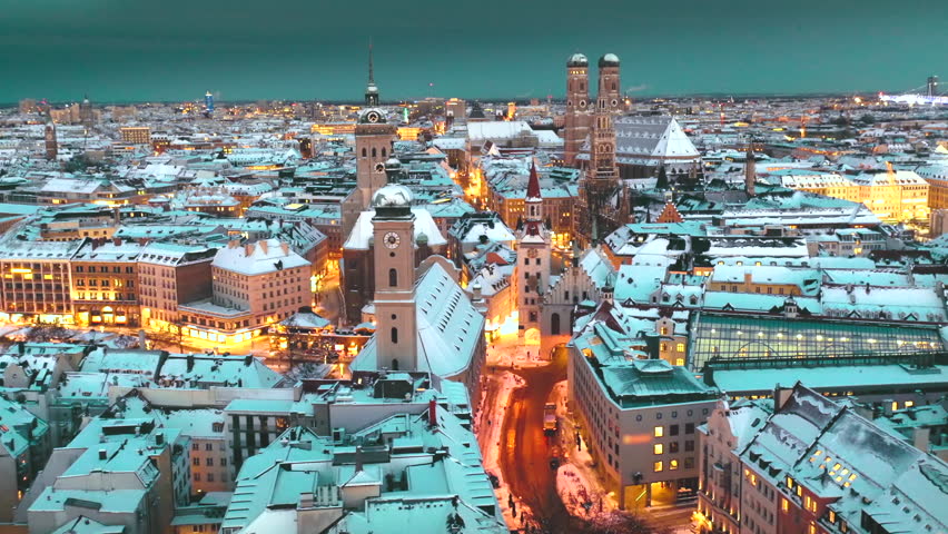 Munich Winter beautiful aerial footage of Frauenkirche gothic church, Marienplatz and the magestic New Town Hall, in the City of Munich Babaria Germany