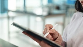 Science, education and hands of woman with tablet for notes, research or study at medical college. Lab, class and Japanese university student with digital app for writing test, exam or online report - Powered by Shutterstock - Get 15% off with code: PIKWIZARD15