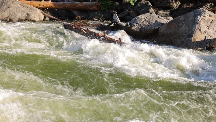 River Rapids in the Merced River as it runs through Yosemite National Park in California. Slow Motion.