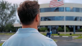 American flag outdoors. American Man holds usa national flag against blue cloudy sky. 4th July Independence Day. Memorial and Veterans Day. Smiling Mature American Patriot holding the USA Flag. - Powered by Shutterstock - Get 15% off with code: PIKWIZARD15