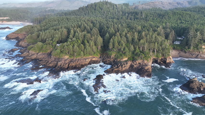 The Pacific Ocean washes against the rocky and rugged coastline of Oregon, not far south of Lincoln City. This part of the Pacific Northwest coast is incredibly scenic and accessed from highway 101.