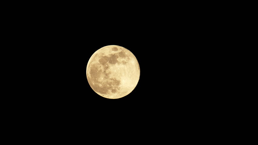
Full moon moving fast in the night sky, 4k video