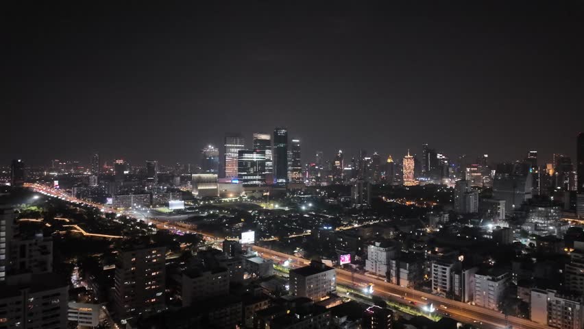 Bangkok cityscape at night with buildings