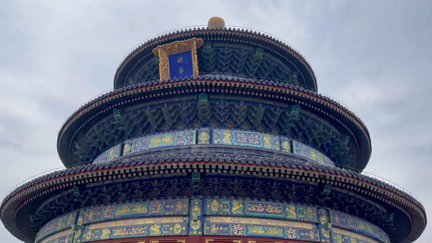 Top of the Temple of Heaven with cloudy sky - Beijing, China Chinese characters translation : Hall of Prayer